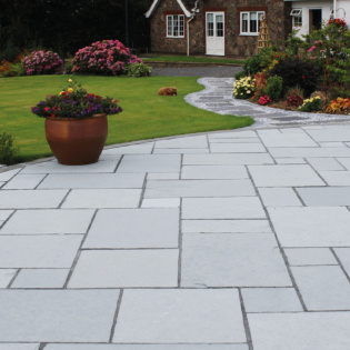 Luxury Garden With Natural Paving Patio in Steel Blue Limestone